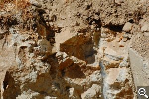 Profile of the rocky subsoil at Skyline Vineyard. Less than 4" of topsoil cover a complex mixture of shale, limestone, sandstone and mudstone.